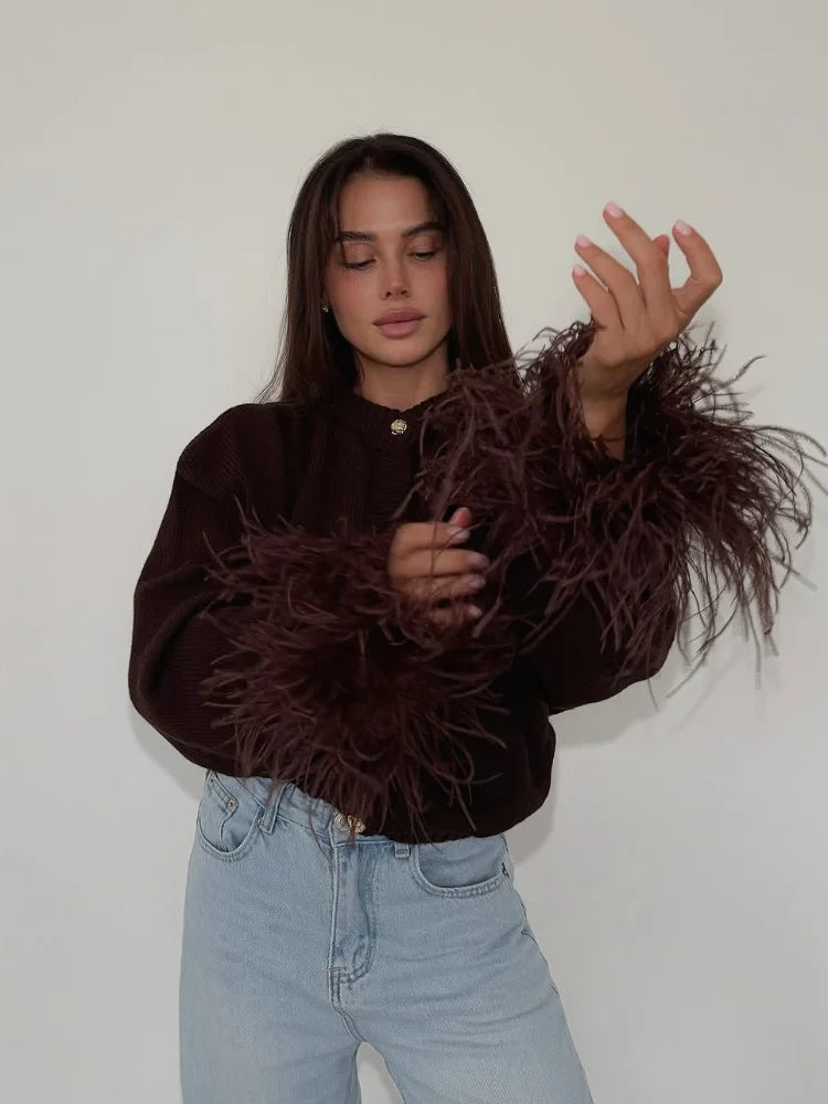 קרדיגן סרוג עם נוצות בשרוולים